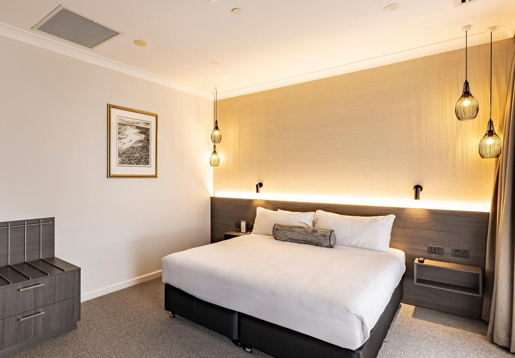 Duxton Hotel Перт Экстерьер фото A bedroom at the hotel